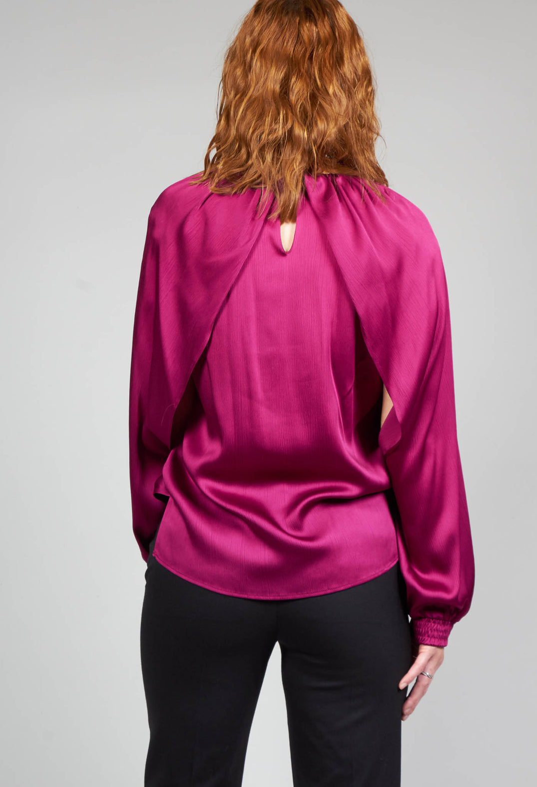 crepe shirt back detailing in metallic pink with a neck button fastening and long sleeves 