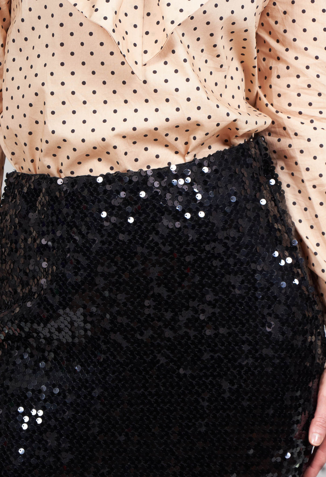 close up of a black sequin skirt