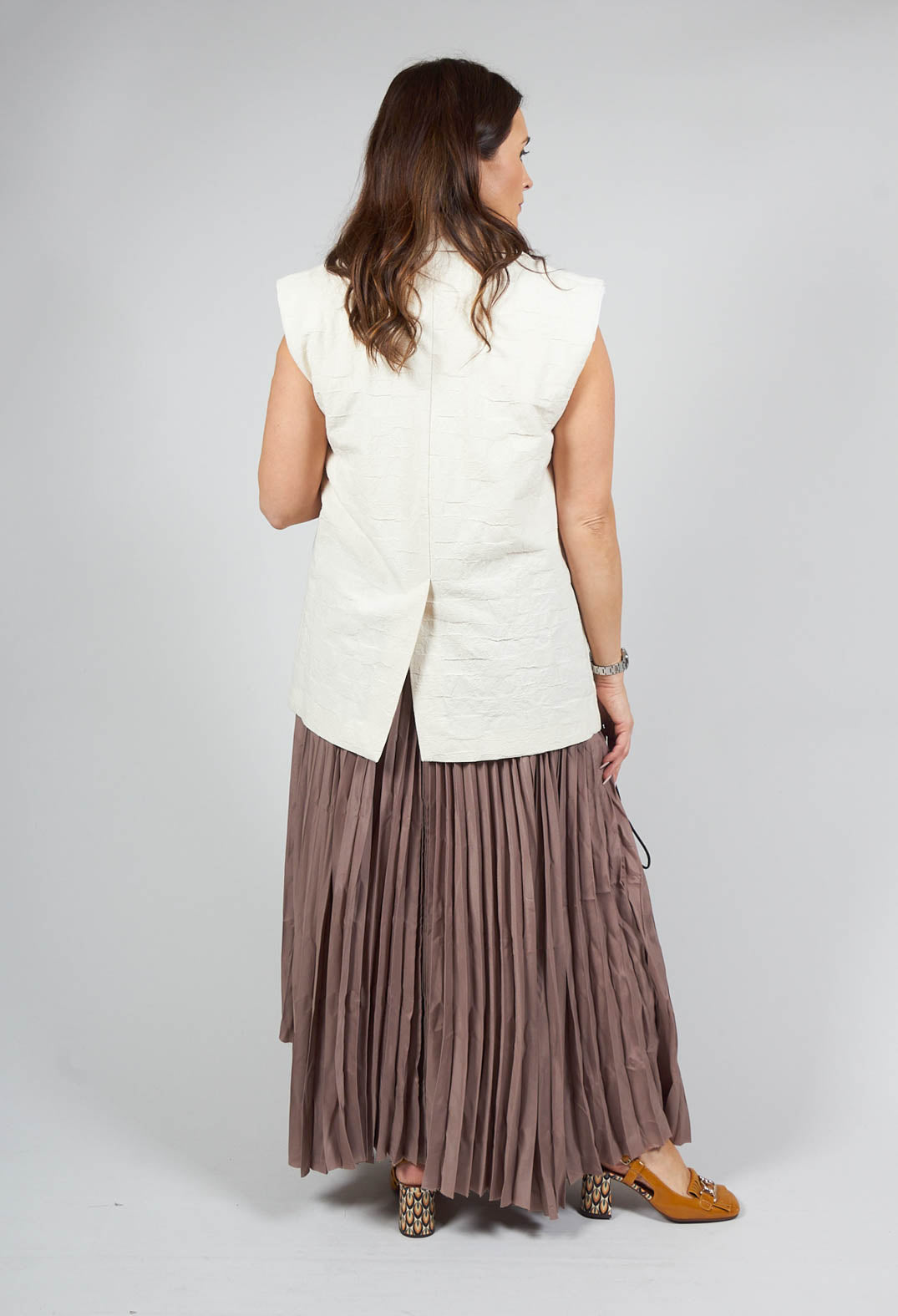 Pleated Skirt with Asymmetric Hem in Brown