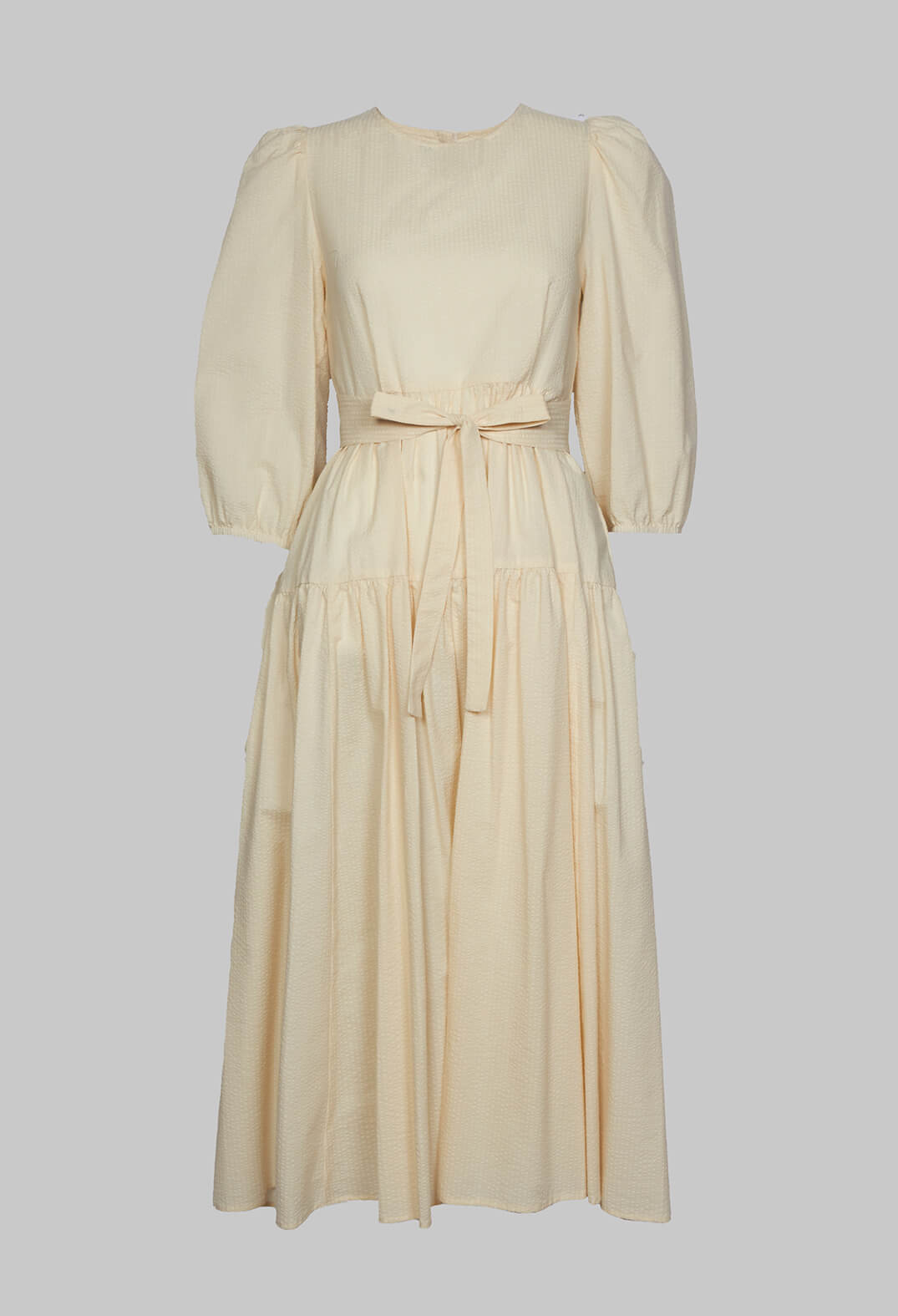 backless cream dress by beatrice b with tie bow waist detailing behind