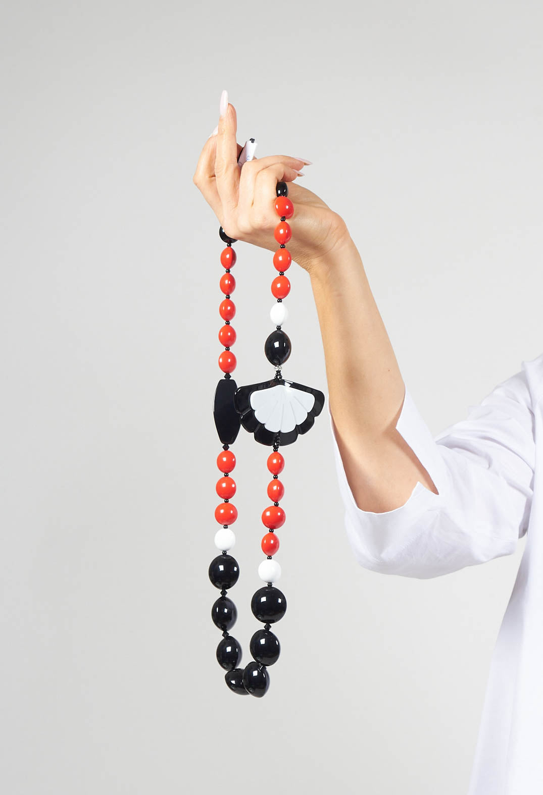 Beaded Necklace with Fan Pendant in Black, Red and White