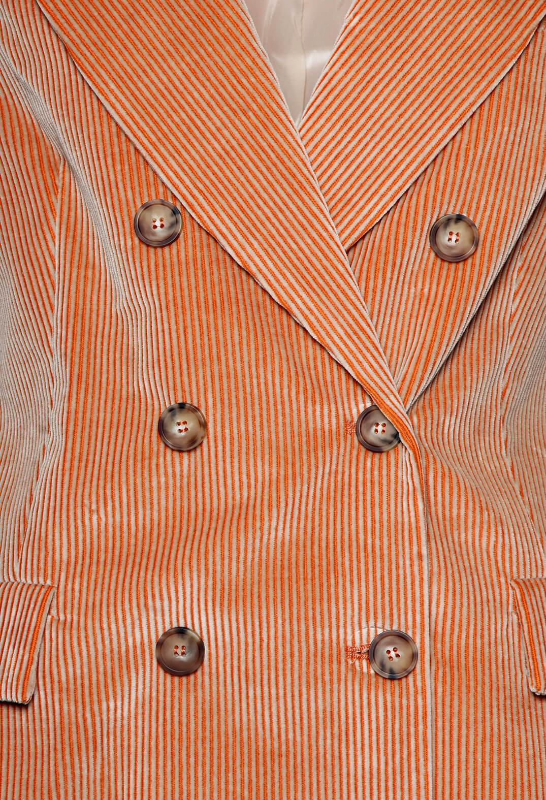 buttons fastened on corduroy jacket by beatrice b