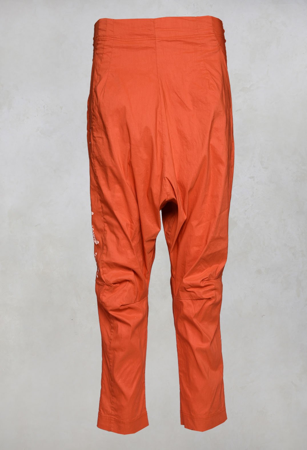 Drop Crotch Trousers in Orange Print