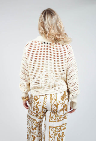 back detail of knitted polo top in tofu