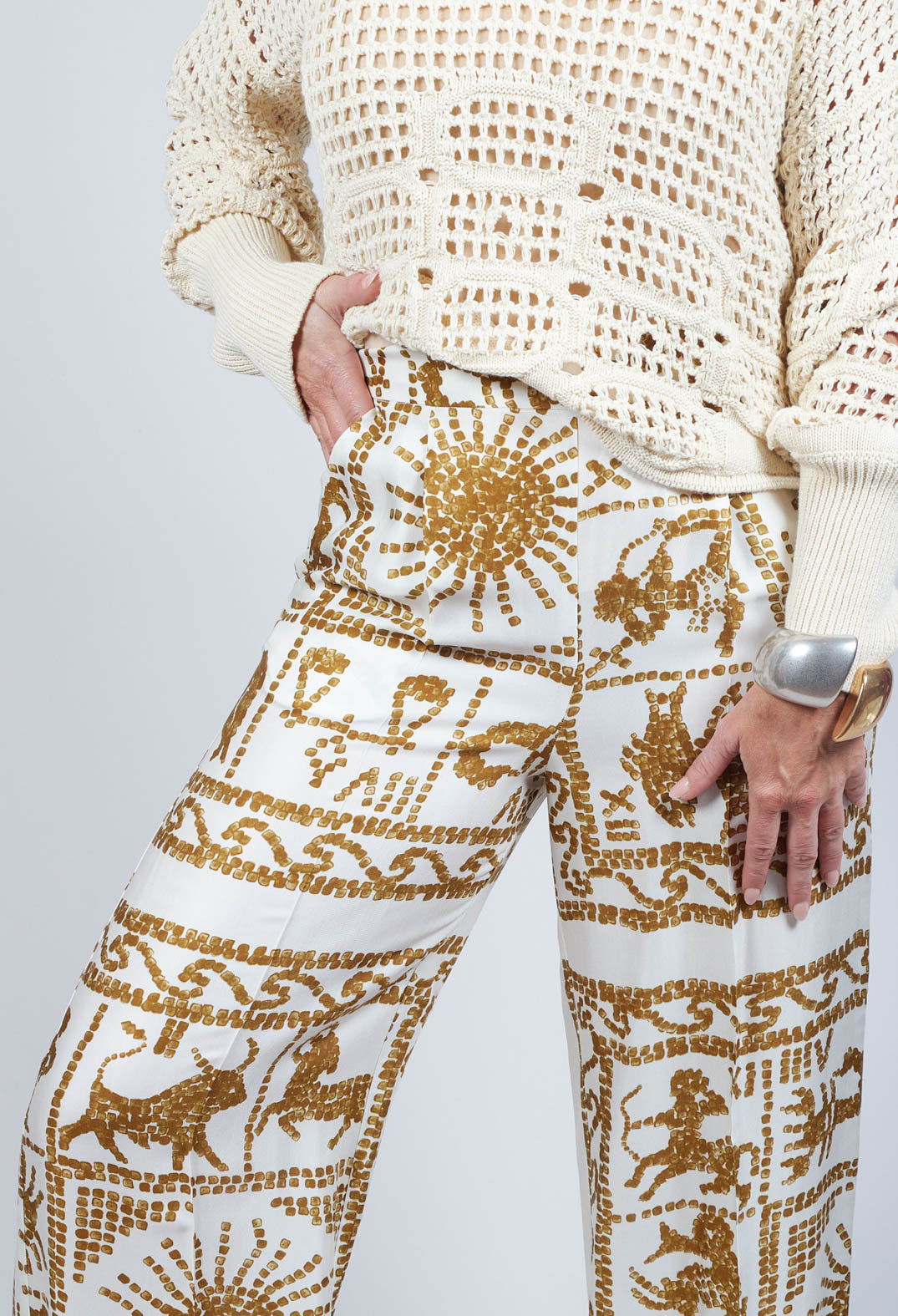 close up of wide leg trousers in zodiac print