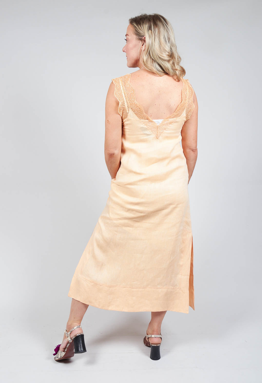 back detailing of midi dress with lace detail in orange