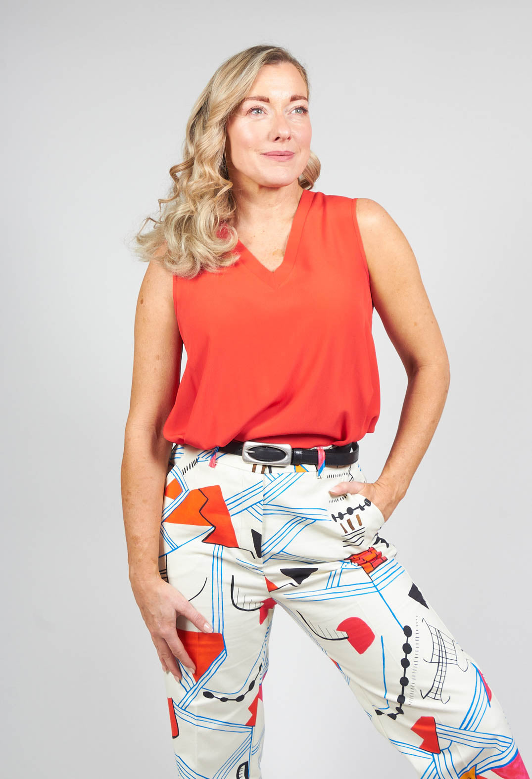 red v neck style top with loose fit