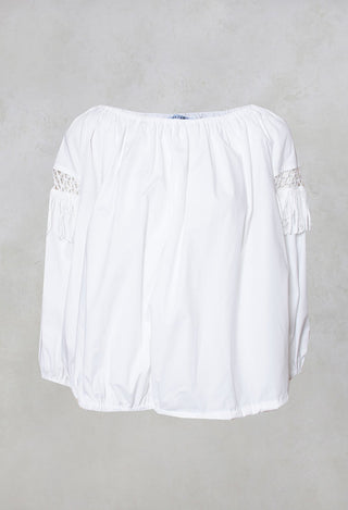 white fringe open work detail blouse