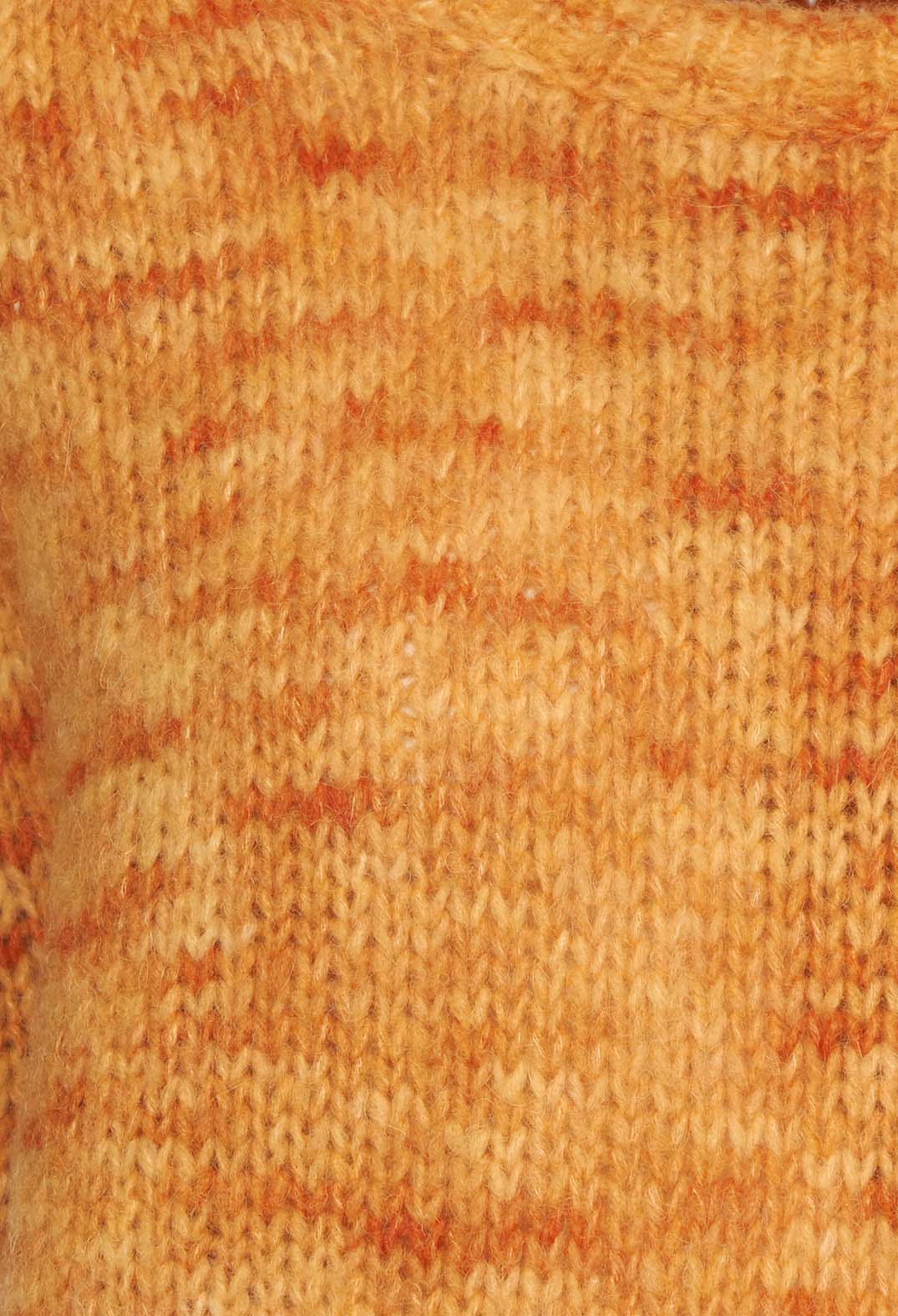 close up of orange knit vest