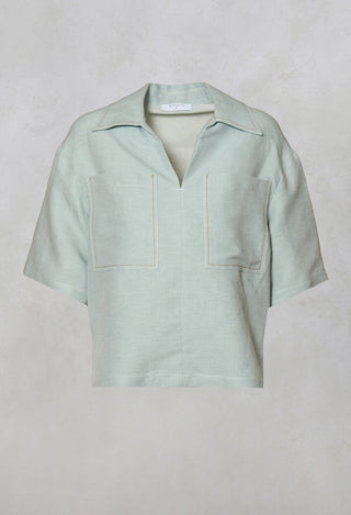sky linen blouse with large pockets and neck collar