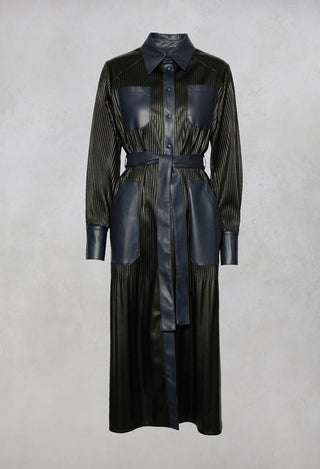 long faux leather navy dress with waist tie belt, front pockets, button fastening and neck collar detailing