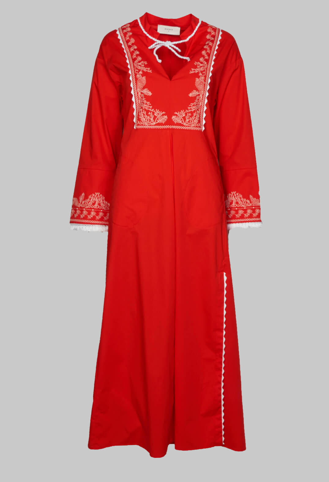 red dress with long sleeves and embroidery