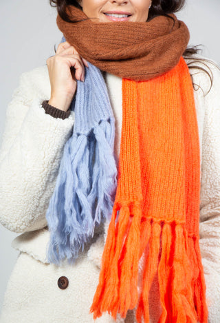 close up of stamina orange knitted scarf