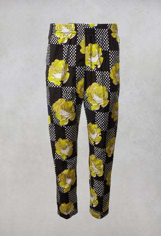 yellow peg trousers with a floral print