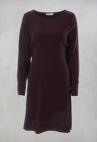 plum pleated shift dress with long sleeves