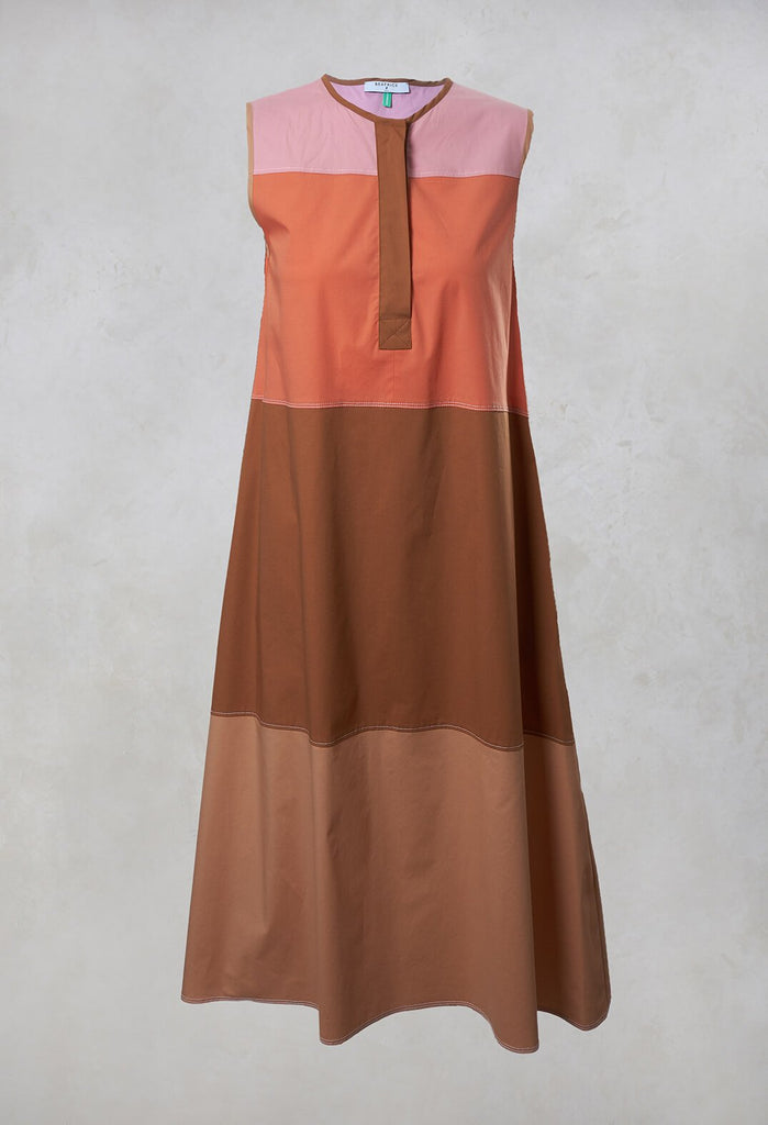 light brown shift dress with buttons for neck collar 