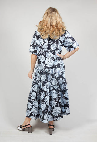 behind shot of shirt dress in bloom print with mid length sleeves