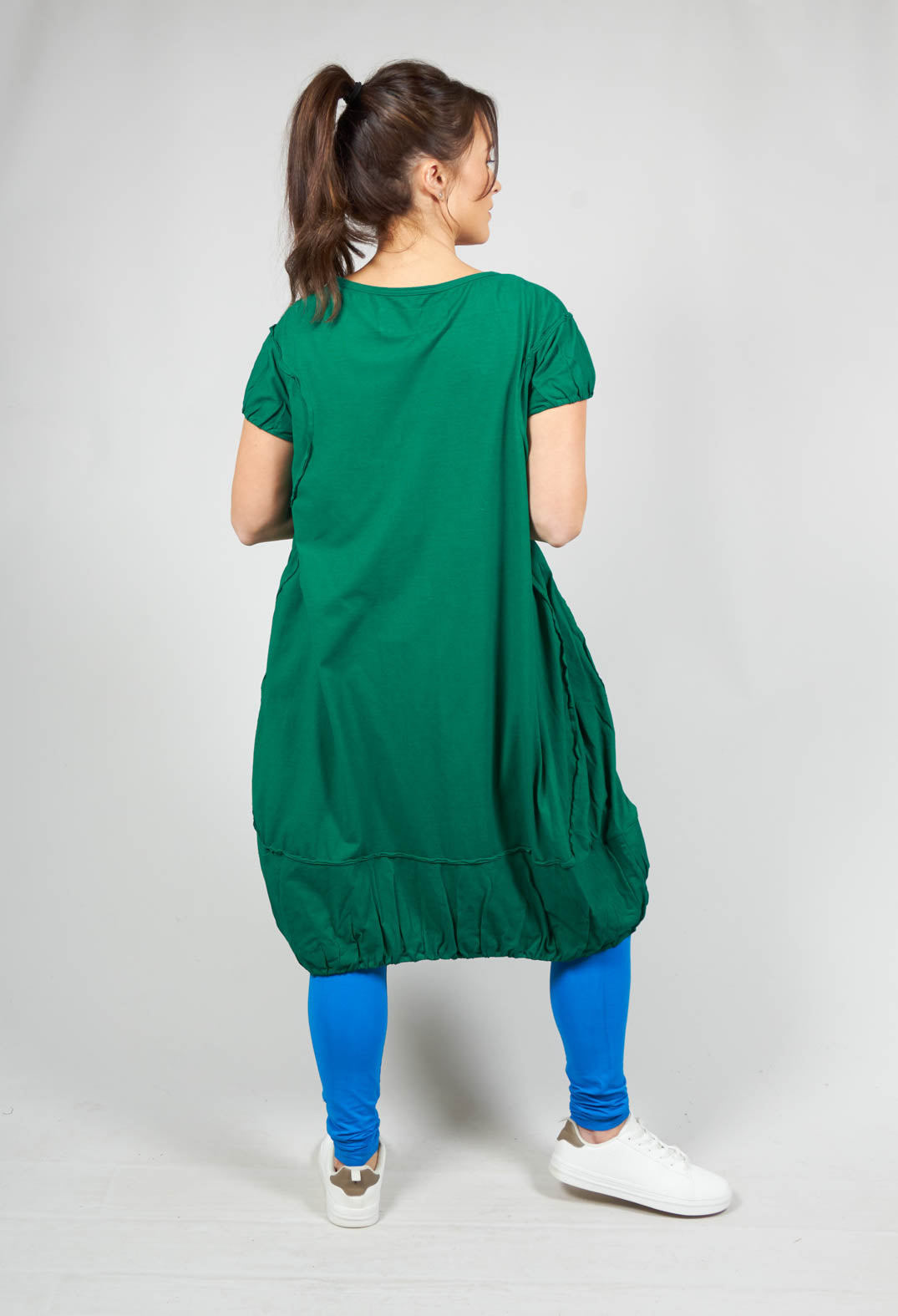 short sleeved ladies jersey dress in green with gathered hem