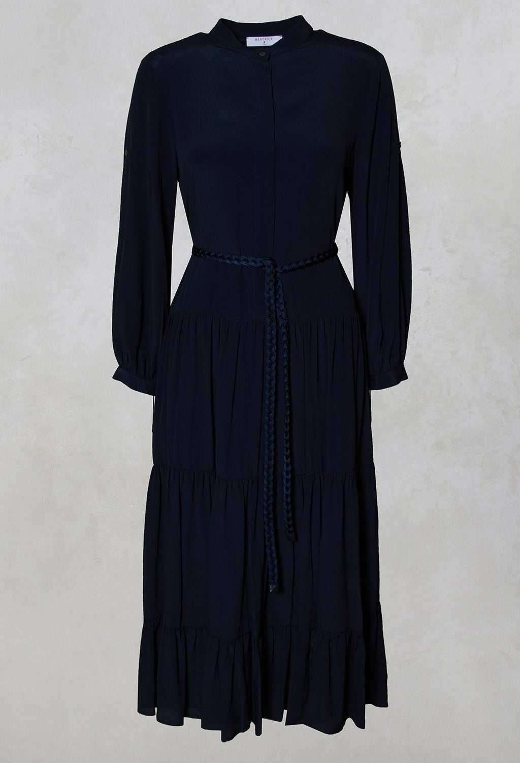 blue tiered maxi dress with long sleeves and button fastening