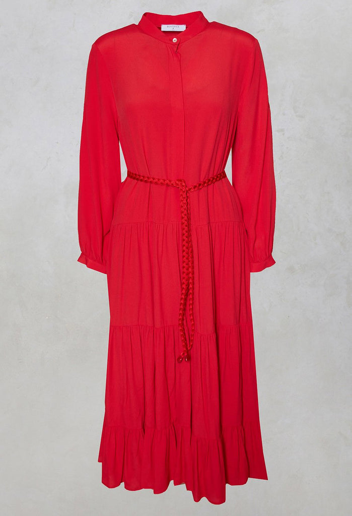 tiered maxi dress in red with waist tie belt and button fastening