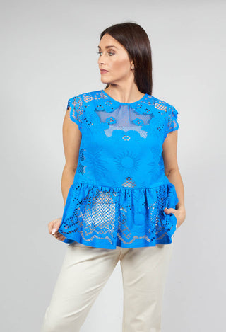 lady wearing the Beatrice B lace detail top in blue