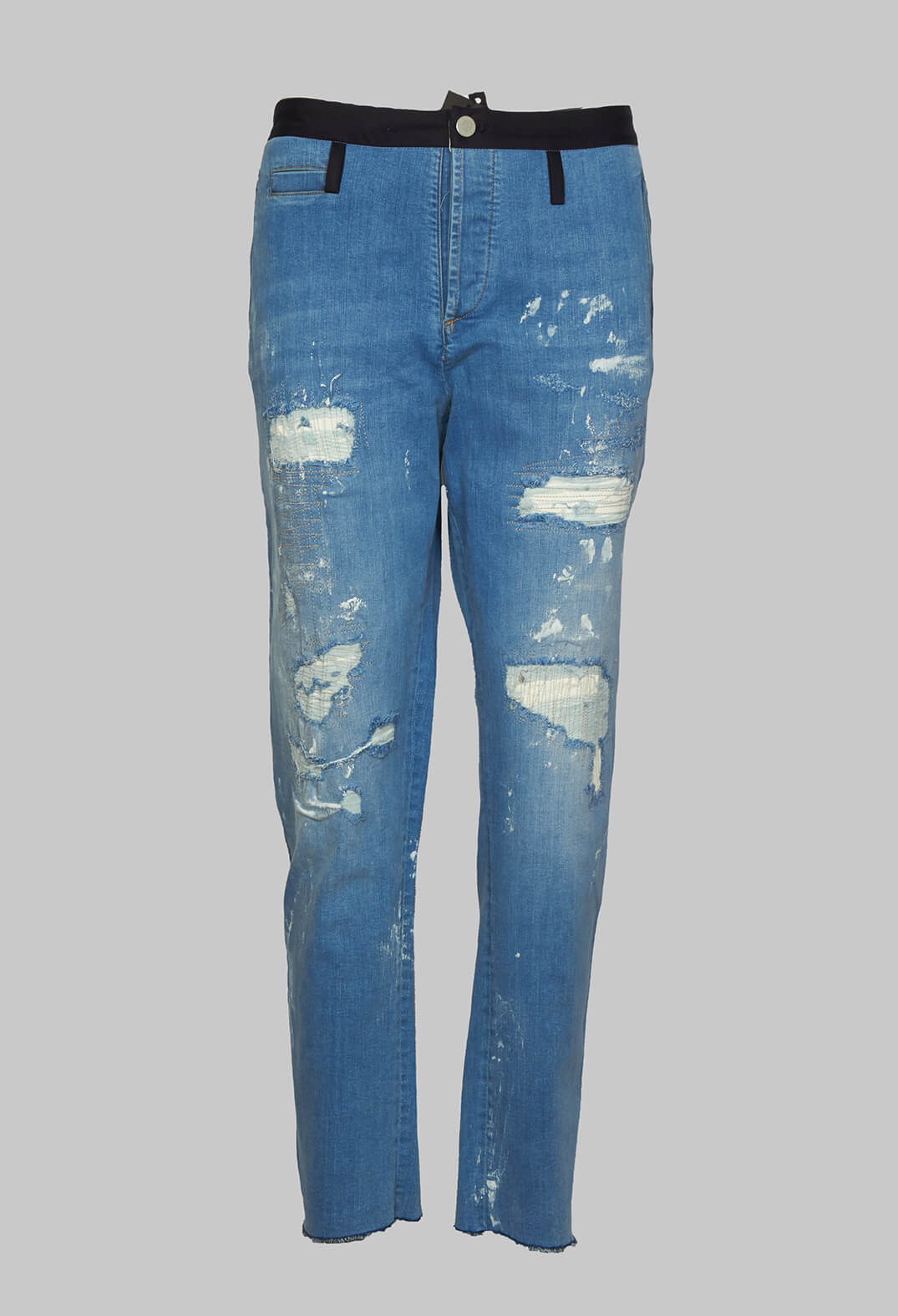 Tapered Fit Jeans with Distressed Patch Detail in Mid Blue