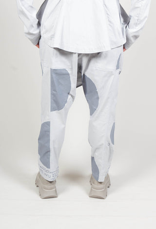Trousers with Front Overlay in Water Print