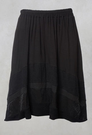 Long Skirt with Asymmetric Hem in Black